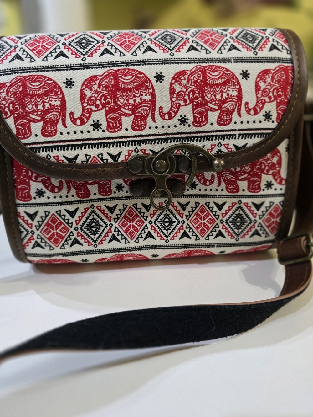 Red Elephant Pattern Crossbody Bag with Brown Trim